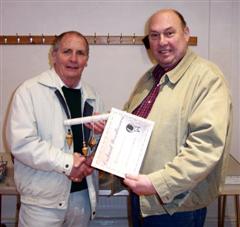 The monthly winner Howard Overton received his certificate from Peter Blake